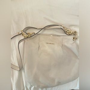 Michael kors white crossbody pouch bag.